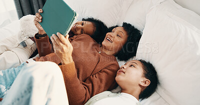 Buy stock photo Streaming, parent or girls on bed with tablet, cartoon show or bonding in multimedia binge. Relax, smile or family in home with tech, movie subscription or watching entertainment on kids platform.