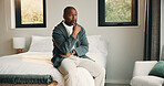 Serious, man and thinking on bed, home and planning for personal growth with ideas or imagine future. Mature black person, reflection and decision for self development, remember and contemplating