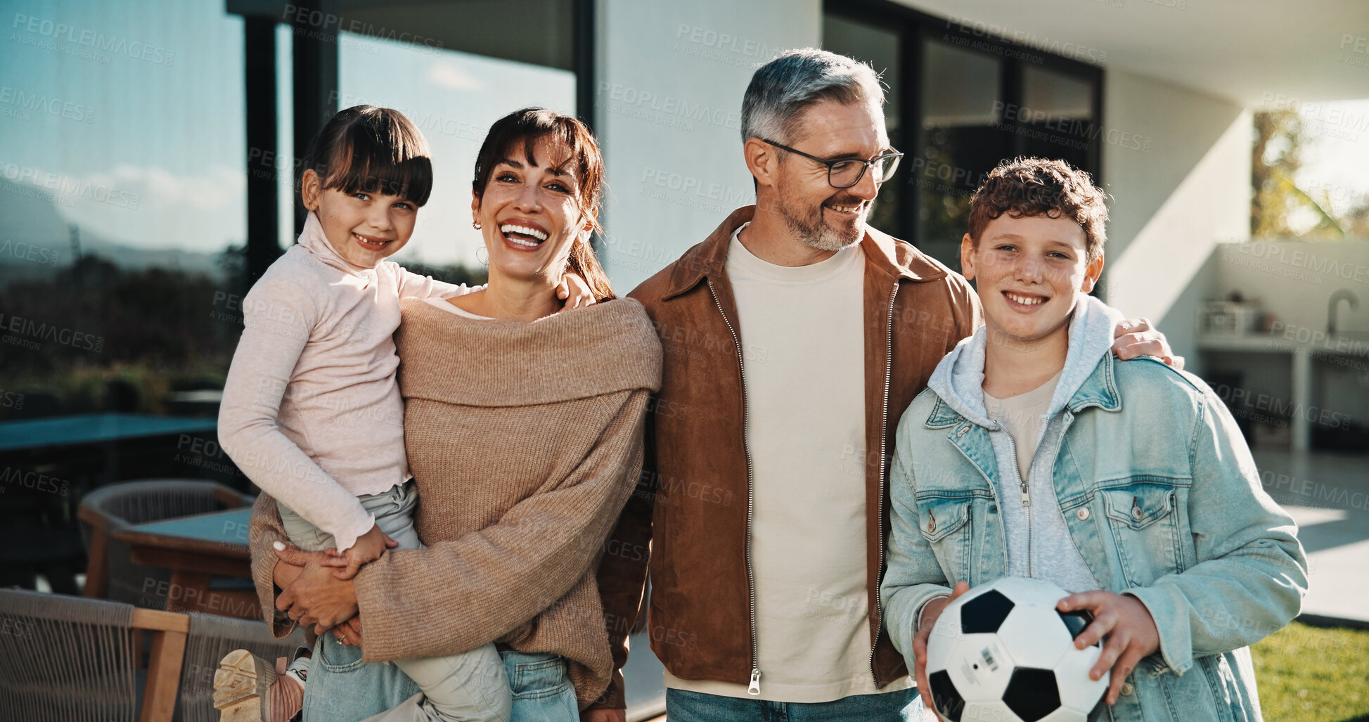 Buy stock photo Soccer, love and portrait of family outdoor for bonding, support and teaching game. Football, connection and weekend break with parents and children in backyard of home for growth, fun and care