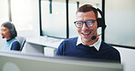 Telemarketing, man and headset at computer in call center for service promotion, offer or happy. Friendly, sales consultant and discussion on tech for product knowledge, lead generation or coworking