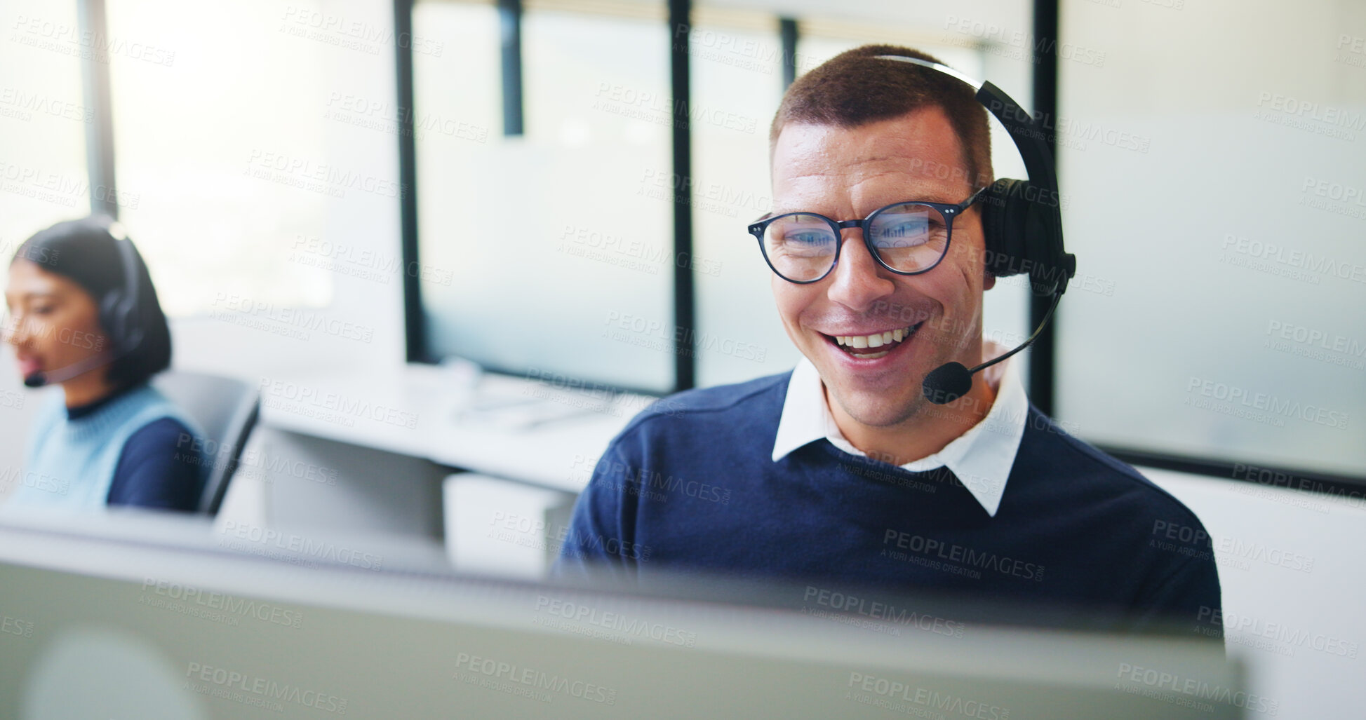 Buy stock photo Telemarketing, man and headset at computer in call center for service promotion, offer or happy. Friendly, sales consultant and discussion on tech for product knowledge, lead generation or coworking