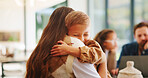 Mother, son and hug in home with family connection, bonding together and support for child development. Happy, mom and young boy in living room with embrace, wellness and parent care on weekend.