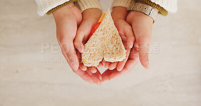 Buy stock photo Hands, family and heart with food at house for homemade lunch, meal prep and cheese sandwich. Above, person or child with organic bread, healthy vegetables and love symbol for nutrition snack in home