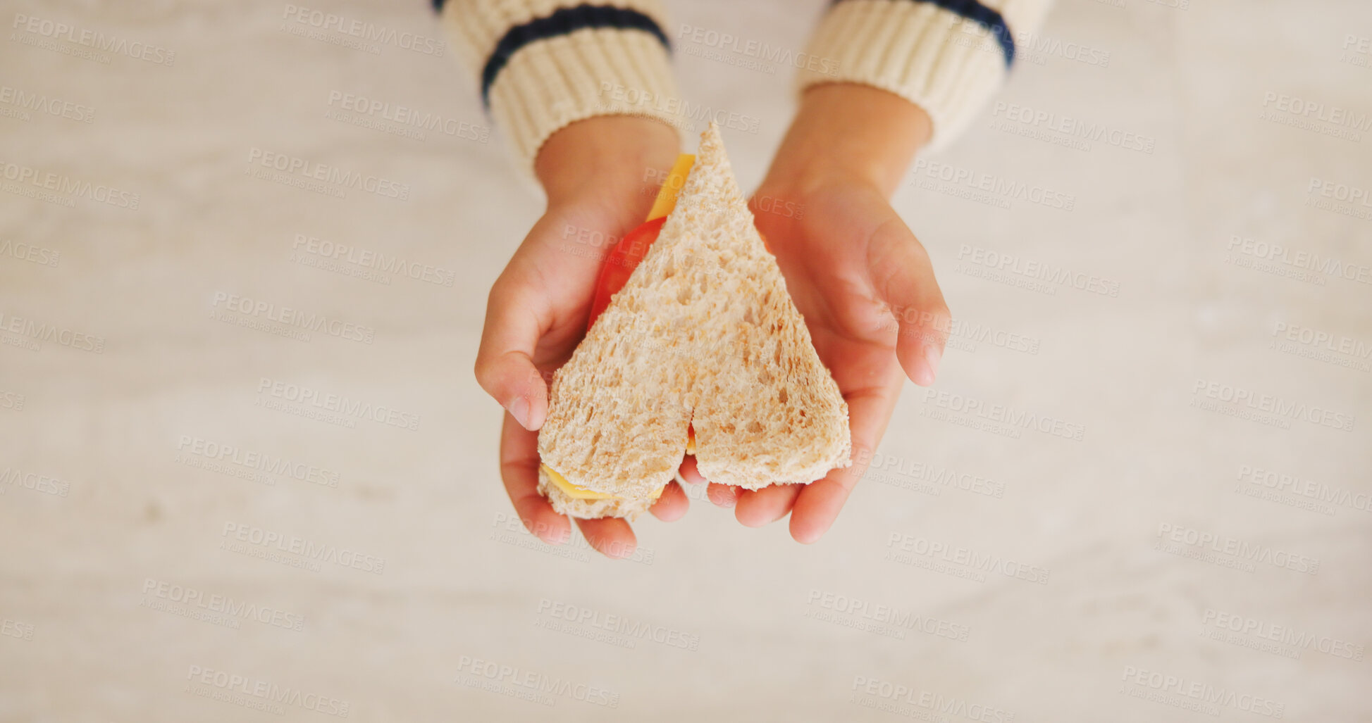 Buy stock photo Hands, child and heart with food at house for homemade lunch, meal prep and cheese sandwich. Above, kid and love symbol with organic bread, healthy ingredients and wheat for nutrition brunch in home