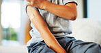 Child, plaster and arm for healthcare or wellness with immunisation, vaccine or first aid care. Bandage, healing and girl on bed for flu shot, immunity and medicine for health or development