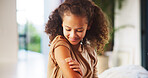 Girl, touch and plaster for vaccine in home with flu shot, healthcare and smile in bedroom. Kid, bandage and happy with injection for medicine with immune system boost, virus or germs at apartment