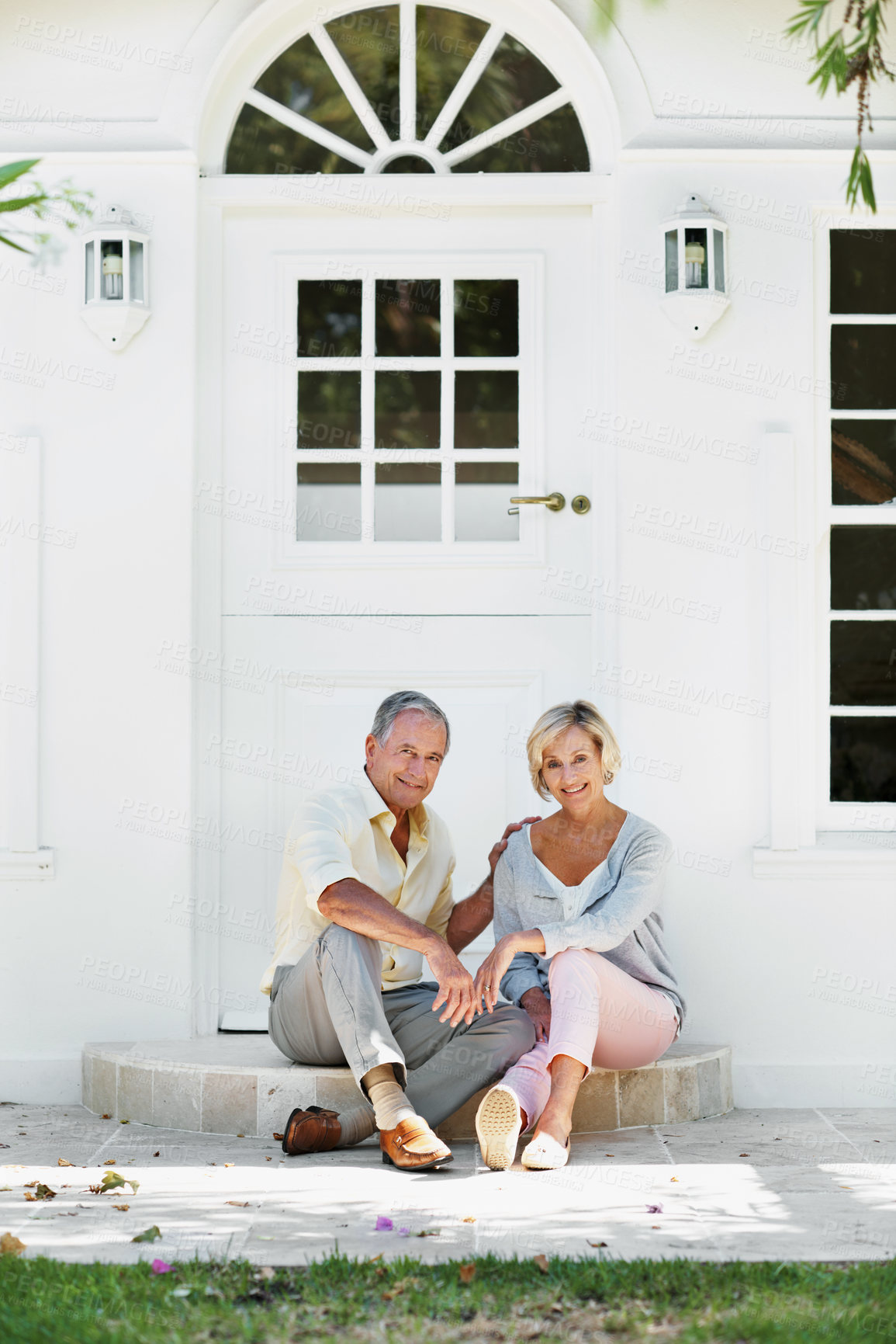 Buy stock photo Portrait, old couple and smile at front door for travel, love and bonding together for summer holiday. Happy, senior people and rest at house for fresh air, partner support and commitment on vacation