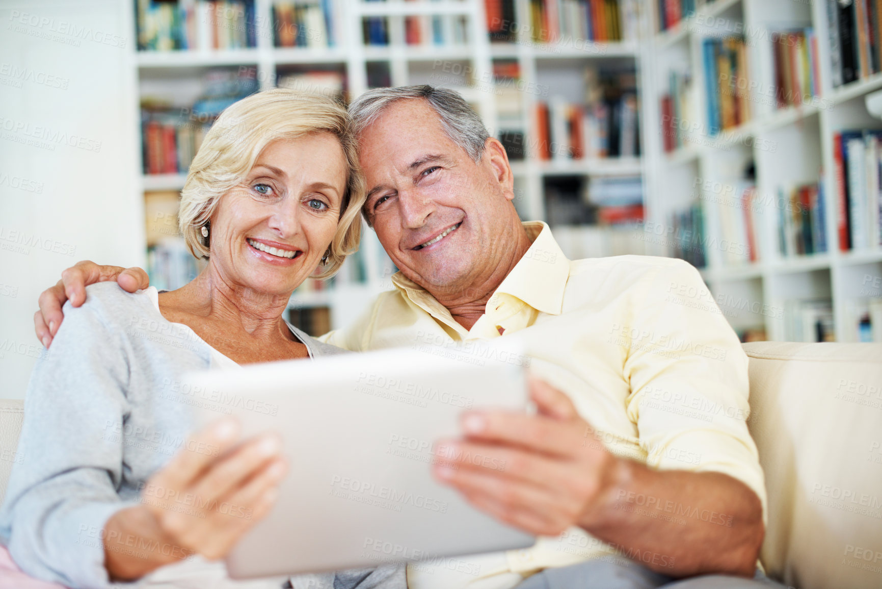 Buy stock photo Portrait, smile and tablet with old couple on sofa in home for bonding, ebook search and support. Digital library platform, happy and retirement with senior man and woman in house for love and media