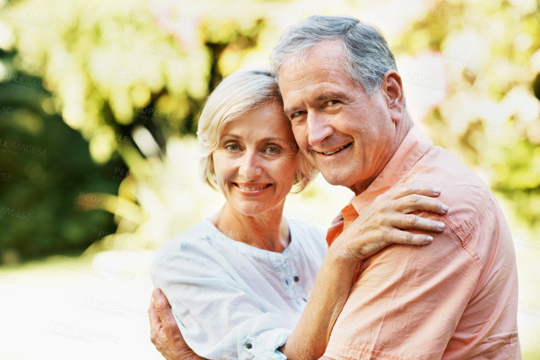 Buy stock photo Happy, portrait and old couple hug in park, connection and love with fresh air and bonding outdoor. Senior, man and woman with smile in nature, break and together for retirement, trust and care