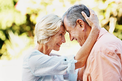 Buy stock photo Shot of a senior couple enjoying the day together