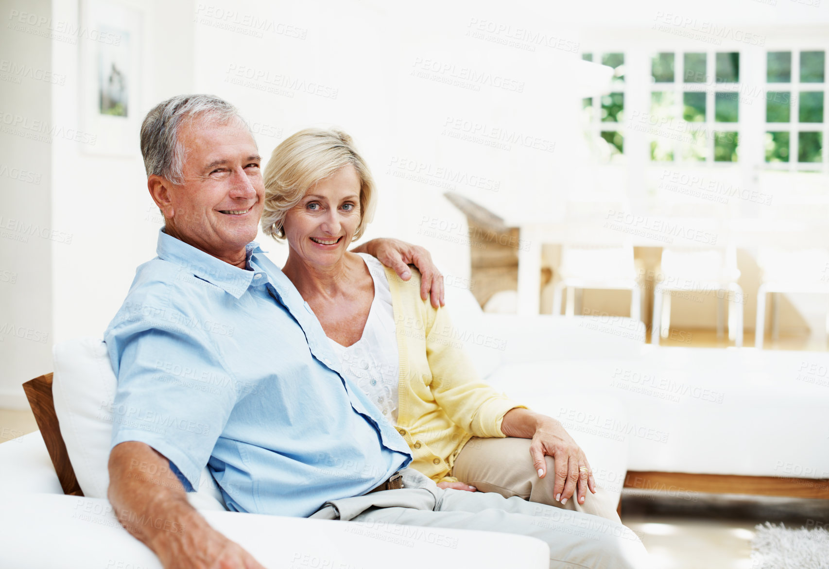 Buy stock photo Portrait, hug and happy with old couple in home for bonding, connection and marriage. Retirement, support and commitment with senior man and woman in living room of house for relax, love and care