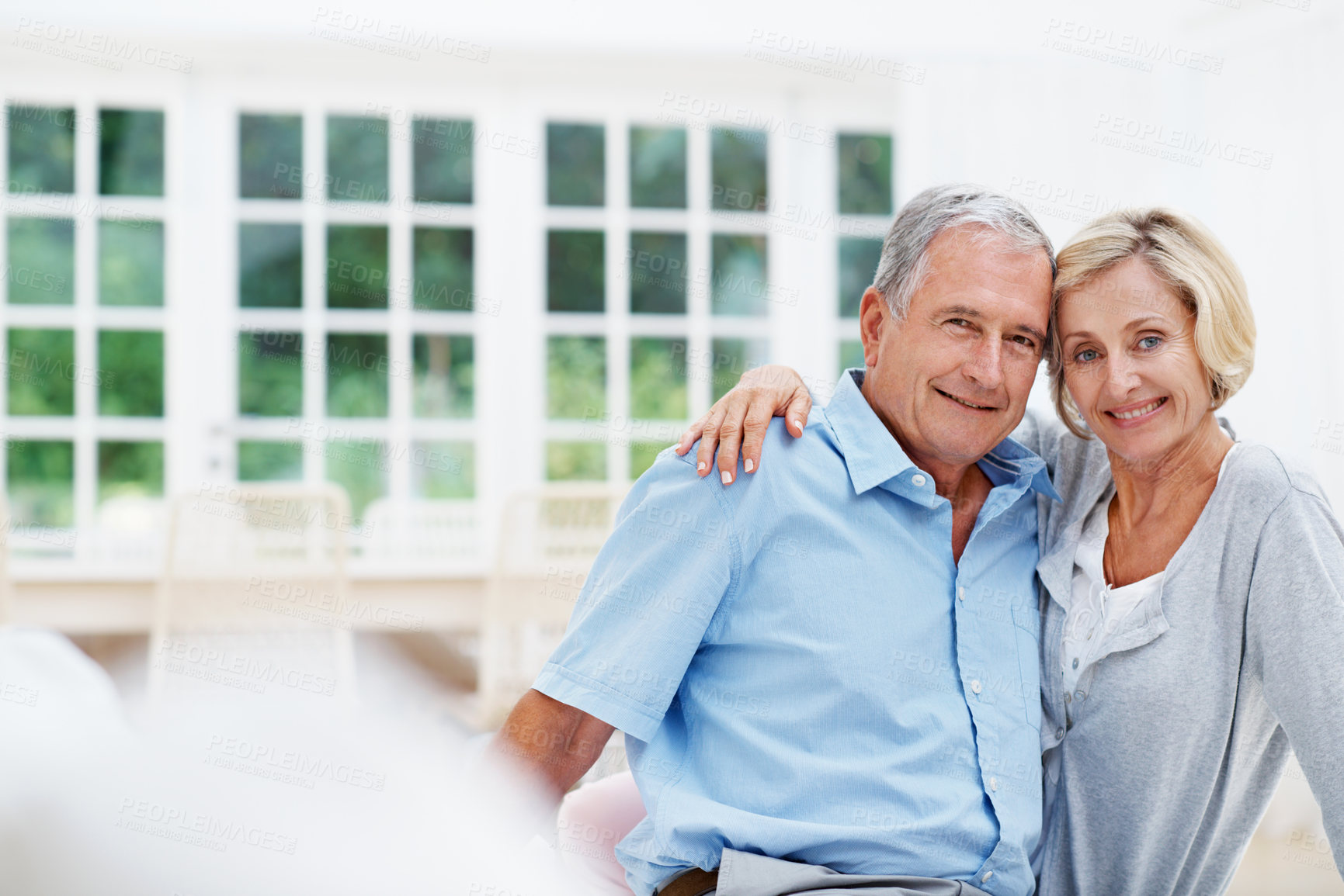 Buy stock photo Smile, hug and portrait with old couple on sofa in home for bonding, connection and marriage. Support, weekend break and retirement with senior man and woman in living room in house for loyalty