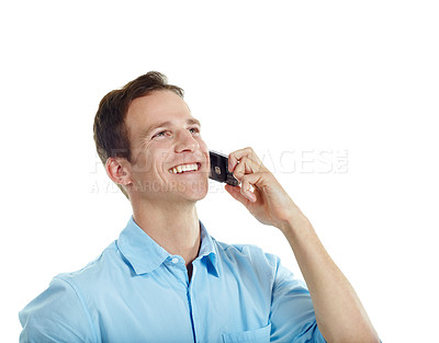 Buy stock photo Laugh, space and businessman in studio for phone call, communication and funny conversation. Happy, thinking and person on cellphone for discussion, contact and talking with humor on white background