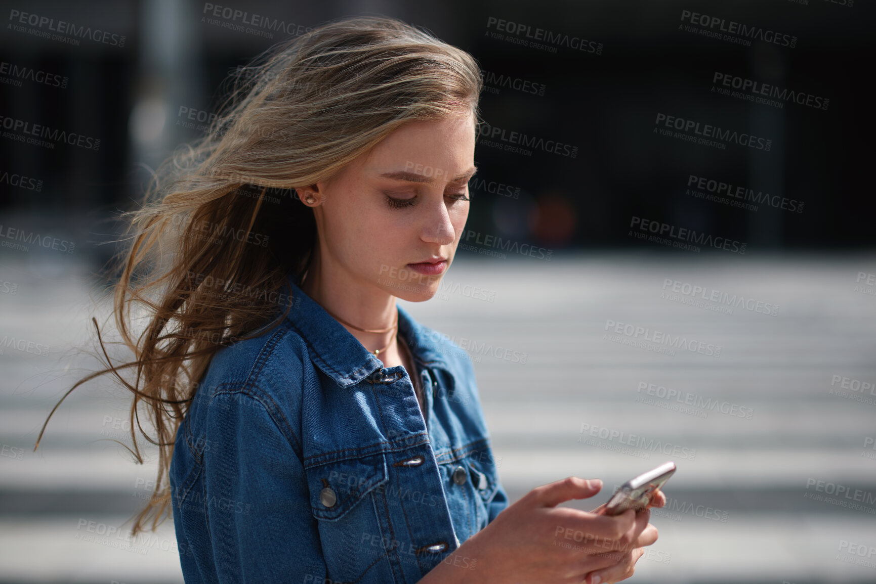 Buy stock photo Outdoor, student and woman with phone for commute, reading message and university app for schedule. City, morning travel and scholar with mobile for directions, digital navigation and check location