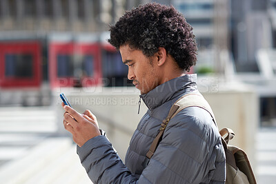 Buy stock photo City, student and black man with phone for commute, digital navigation and university app for schedule. Serious, morning travel or person with mobile for directions, reading message or check location