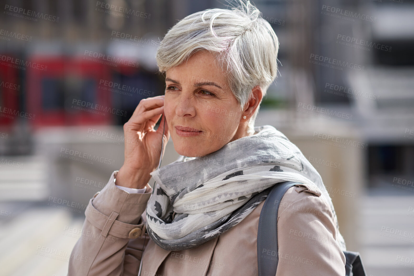 Buy stock photo Business, travel and woman in city with earphones, streaming and listening to music with vision. Thinking, mature person and morning commute with reflection, daydreaming and podcast audio for journey