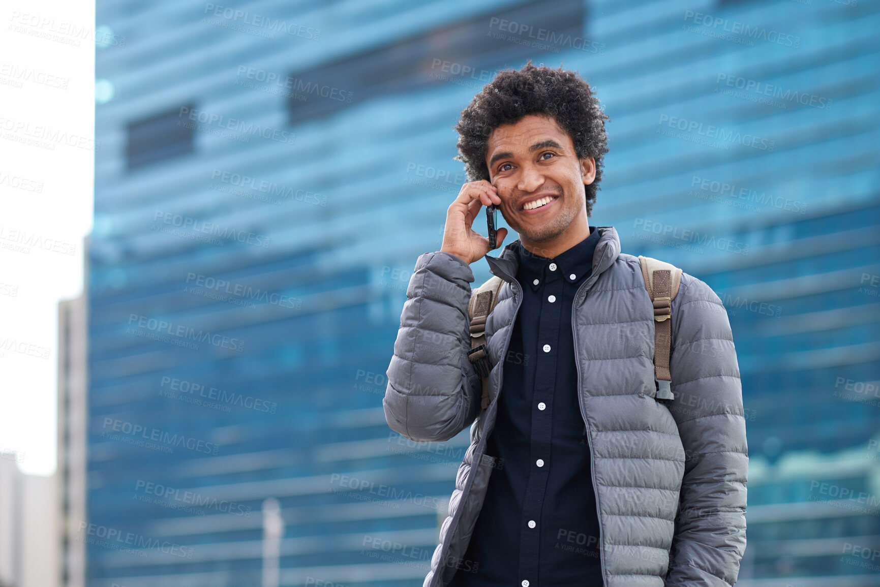 Buy stock photo Student, phone call and man in city, happy and conversation with contact for scholarship update. Mobile, African person and talk in town for connection, education info or chat on commute with space