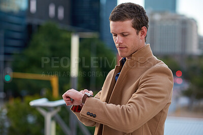 Buy stock photo Businessman, break and smart watch in city with notification, time management or check work schedule. Bokeh, person and employee in urban town with digital tech, calendar and app alert for job email.