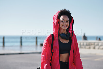 Buy stock photo Teenager, girl and portrait with fitness on promenade, gym gear or equipment with smile for sports practice. African athlete, child and sportswear with training, happy and headphones outdoor