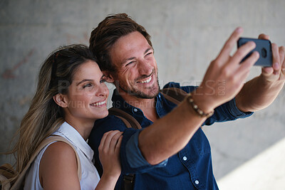 Buy stock photo Outdoor, travel or couple with smile for selfie, holiday memory or social media post for trip update. Photography, support or happy people with picture for bonding, weekend break and vacation in city