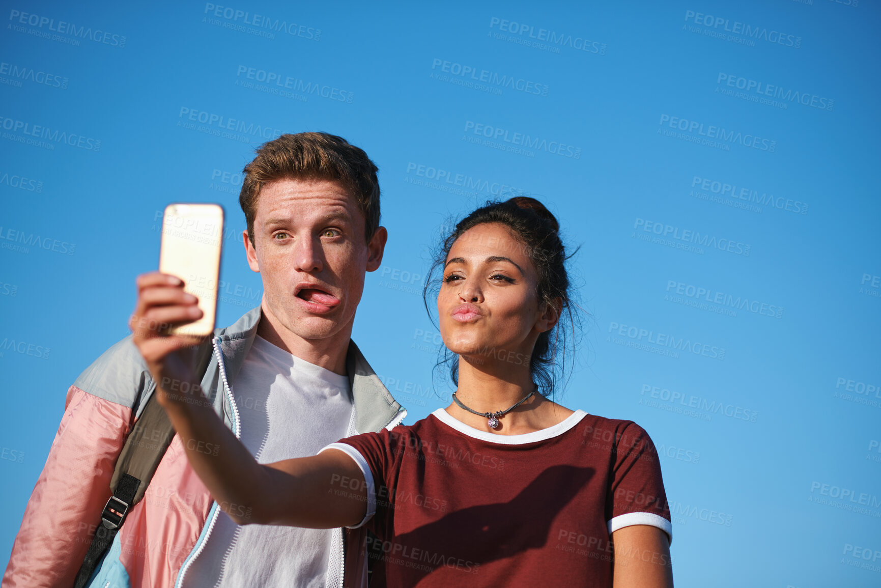 Buy stock photo Outdoor, holiday or couple with funny face for selfie, travel memory or internet post for trip update. Photography, space or playful people with picture for social media, vacation or silly expression