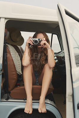 Buy stock photo Travel, camera and woman in camper van for memories on road trip, adventure and vacation in nature. Photography, sightseeing and person in vehicle with picture for tourism, holiday or journey outdoor