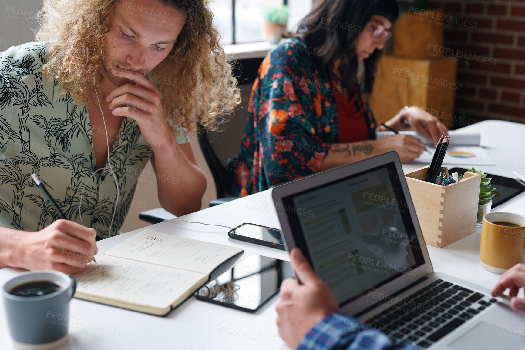 Buy stock photo Creative, coworking and people in office with laptop, notebook and planning at magazine agency. Publishing, team and workers with notes, tech and meeting for article idea, trending topics and story