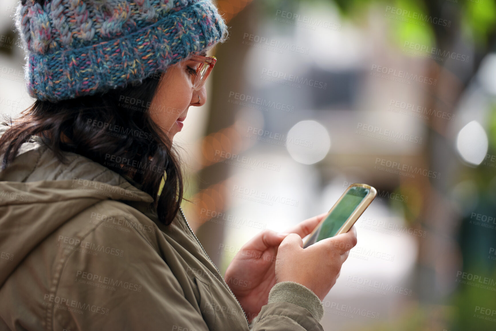 Buy stock photo Woman, reading and typing in city with phone, social media update and notification for text message. Smile, person and scroll outdoor in urban town with tech, browsing website and online dating app