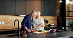 Cooking, home and senior couple with phone in kitchen, connection and reading recipe on social media. Mature people, online and meal prep instructions on mobile, search and skill development in house