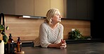 Morning, thinking and senior woman in kitchen for memory, reflection and planning day on weekend. Retirement, house and elderly person with daydreaming, thoughtful and nostalgia for calm or peace