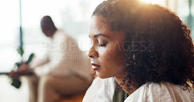 Buy stock photo Couple, fight and sad woman thinking in home with anger, divorce and cheating with toxic relationship. Marriage crisis, doubt and girl ignore man in living room with emotion, breakup and upset