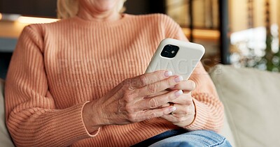 Buy stock photo Typing, online and hands with phone in lounge, texting or communication with contact on social media. Scroll, message and mature person with mobile, network and chatting on website with tech in house