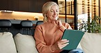 Reading, ebook and woman with tablet in lounge, online and chilling with app subscription on weekend. Mature person, home and happy with fiction novel on website, story and literature entertainment