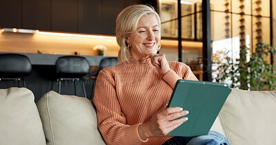 Buy stock photo Reading, ebook and woman with tablet in lounge, online and chilling with app subscription on weekend. Mature person, home and happy with fiction novel on website, story and literature entertainment