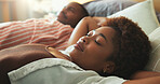 Couple, nap and relax in hotel room with vacation, peaceful afternoon or fatigue from romantic getaway. Black people, sleep or rest in accommodation with comfortable bed, calm holiday or relationship