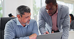 Finance, laptop and talking with business men at desk in office for feedback, review or update. Computer, conversation and report with employee people in financial workplace for wealth management