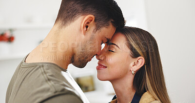 Buy stock photo Cooking, kitchen and couple with forehead touch for bonding, marriage and connection together. Happy, love and man with woman for preparing food on date with care, safety and affection in house.
