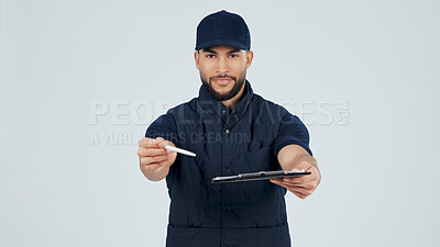 Buy stock photo Sign, clipboard or delivery man with pen in studio for POD, logistics service or distribution. Space, give or courier portrait with receipt on white background for shipping, confirmation or signature