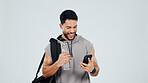 Happy, fitness and man in studio with phone, health results and exercise progress on mobile app. Space, sports and excited person with water bottle, cellphone and workout stats on white background