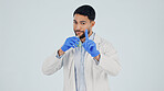 Scientist, portrait or idea with chemical beaker in studio for medical result on a white background. Male person, lab or waiting with glass or solution for scientific experiment or reaction on space