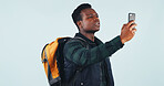 Lost, directions or hiker in studio with phone, no signal or confusion at online map. Digital, worried or black man on white background with tech, poor reception or wrong navigation in trekking hobby