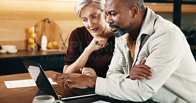 Buy stock photo Mature, couple and conversation in home with laptop, online website and review insurance premium. People, interracial marriage and talk in house with computer, reading policy terms and conditions.