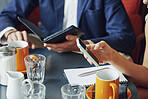 Phone, tablet and hands of people in cafe with notebook to research on creative project with review. Technology, cellphone and magazine editor with manager for feedback on publishing in coffee shop.