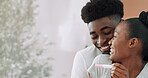 Happy, black couple and pregnancy test in house with positive results, support and ivf success. Smile, people or morning embrace with fertility kit, good news and pregnant partner for future family