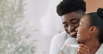 Buy stock photo Happy, black couple and pregnancy test in house with positive results, support and ivf success. Space, people or morning embrace with fertility kit, good news and pregnant partner for future family