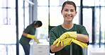 Cleaning service, portrait or woman in office with smile, pride or about us in facility management. Happy, hygiene or janitorial worker with gloves, confidence or career growth in agency maintenance.