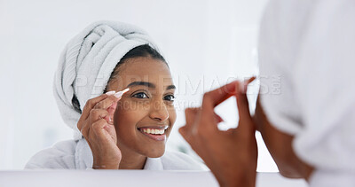 Buy stock photo Woman, mirror and eyebrows with tweezer for beauty, grooming or skincare in bathroom. Reflection, female person or smile with pluck tool for hair removal, epilation or facial correction in home