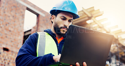 Buy stock photo Laptop, man and typing on construction site with communication for building, renovation or repairs. Safety, feedback and civil engineer with digital tech for inspection update or risk assessment