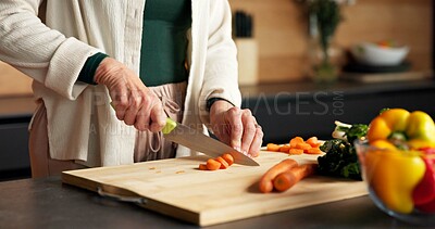 Buy stock photo Hands, woman and vegetables at house for cooking, meal prep and healthy food for vegan lunch. Mature person, cutting or knife in kitchen with organic ingredients, culinary skills and recipe for salad