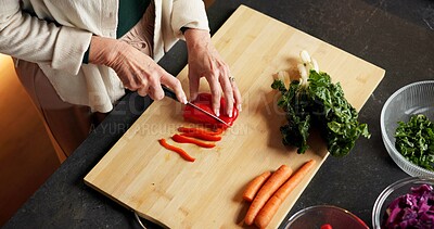 Buy stock photo Hands, woman and vegetables in home for cooking, meal prep and healthy food for vegan lunch. Above, mature person and cutting in kitchen with organic ingredients, culinary skills and recipe for salad